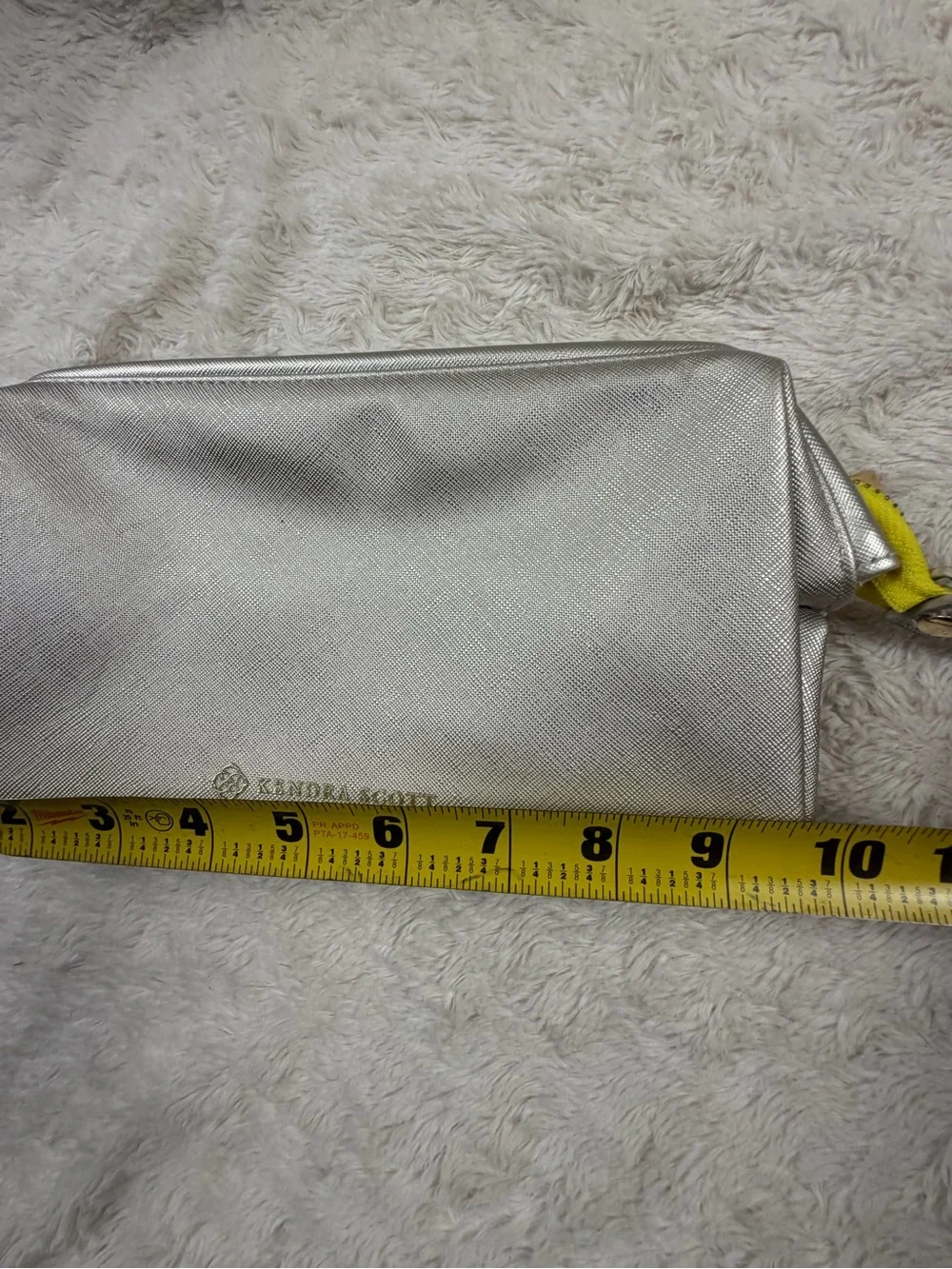 Kendra Scott Metallic Silver Cosmetic Wristlet with Yellow Tab Accent